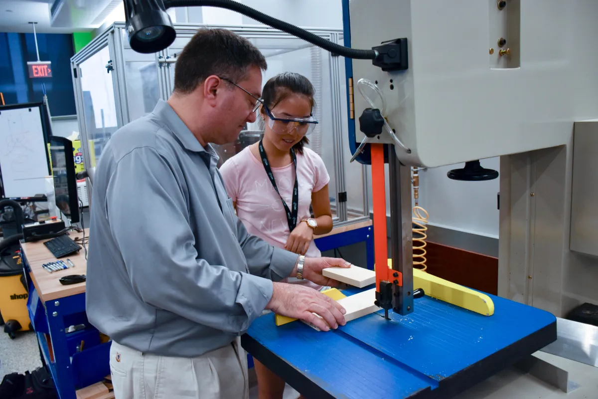 MIT Professor Steven Leeb and First-year Preorientation Program student in a lab.