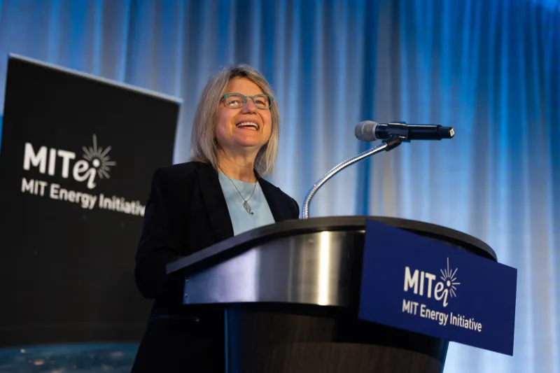 A woman speaks at the podium at MITEI’s 2024 Annual Research Conference.