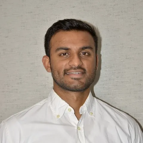 Headshot of Husain Adamji
