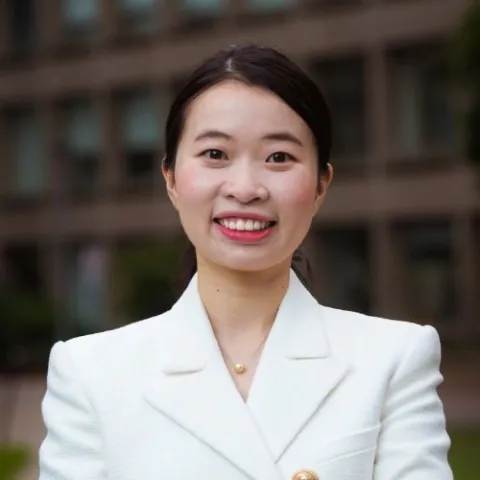Headshot of Maggie Qi