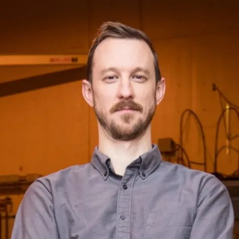 Headshot of Zachary Hartwig