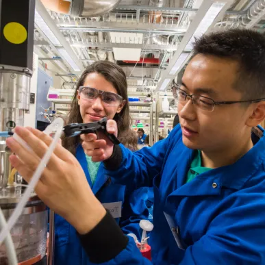 Two students work together in Chemical-Biological Engineering Laboratory