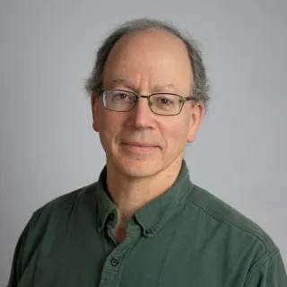 A headshot of Brian Hodder