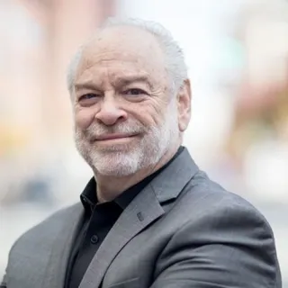 Headshot of Dennis Frenchman