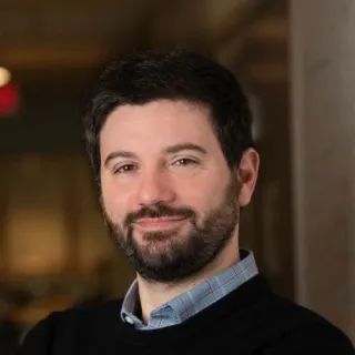 Headshot of Giuseppe Romano 