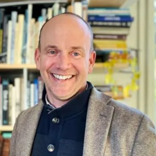 Headshot of John Ochsendorf 