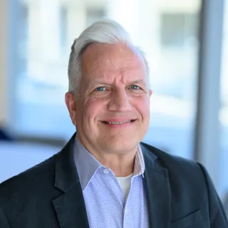 A headshot of Tom Witkowski